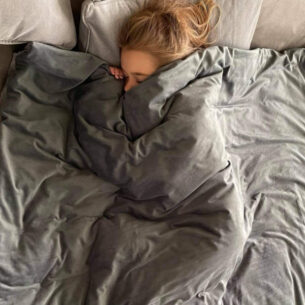 Sleeping Girl with Weighted Blanket